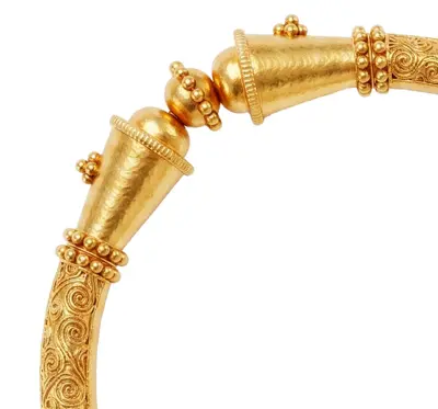 The Ananta Kada, an antique gold kada with a spiral engraved band.